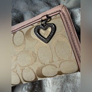 Coach Long zip around wallet in Signature canvas w light chalk pink trim